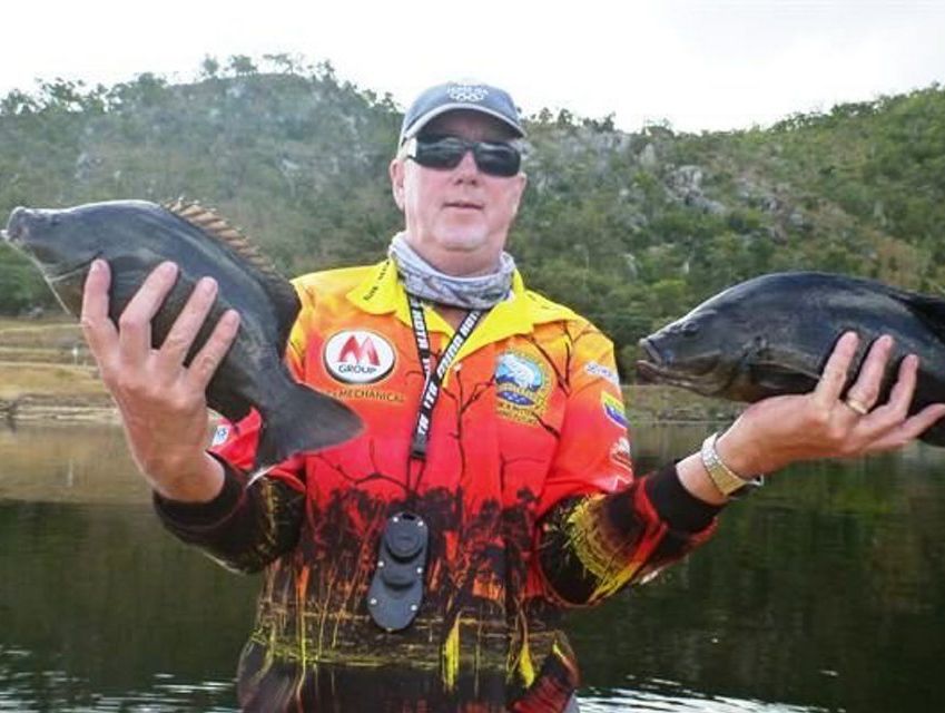Geoff Newby with sooty grunter caught at Eungella Dam. Photo Contributed Geoff Newby with sooty grunter caught at Eungella Dam. Photo Contributed